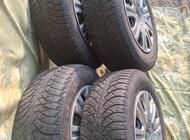 Grajewo ogłoszenia: Sprzedam komplet kół z oponami zima+kołpaki do Skody Octavii.... - zdjęcie